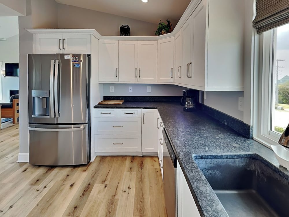 Squirrelly Banana by Topsail Realty