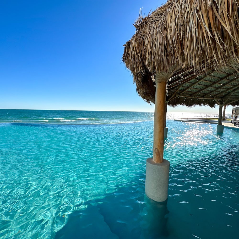 Brand-new Modern 2BR Gem on Iconic Sandy Beach
