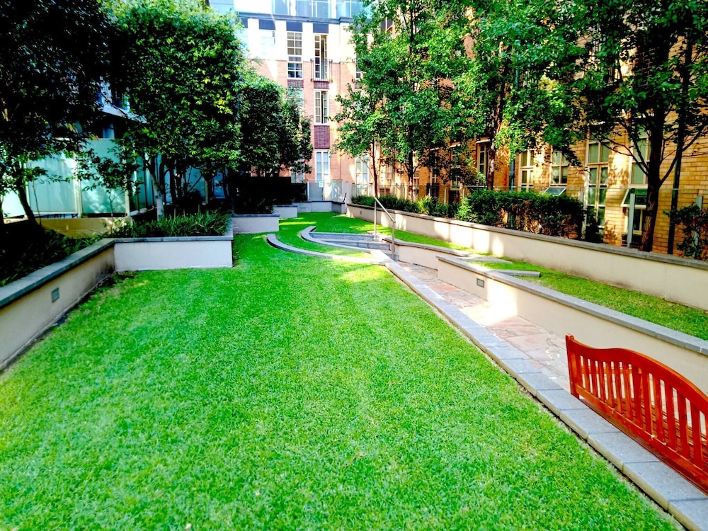 Unwind in Style at Melbourne's Historic Art Deco Apartment With Pool Gym Carpark