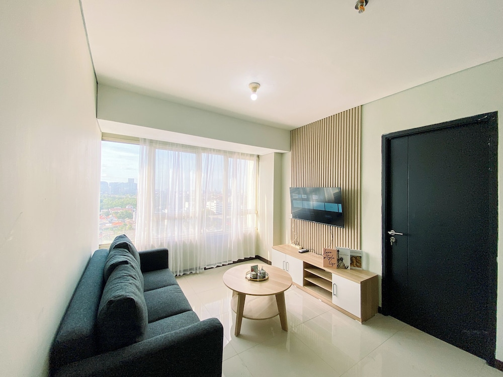 Good Designed and Homey 3BR Nifarro Park Apartment