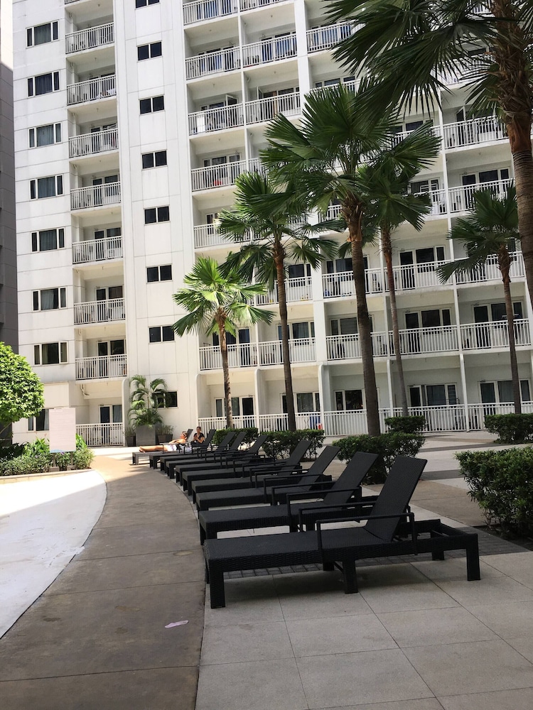 Relax in Pasay City's Best Kept Secret - Spacious Condo With Garden View