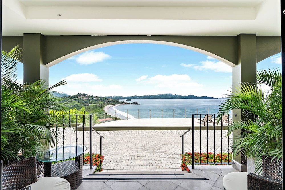 Luxury Condo with Panoramic Ocean Views, Sparkling Infinity Pool, and Modern Open-Concept Design