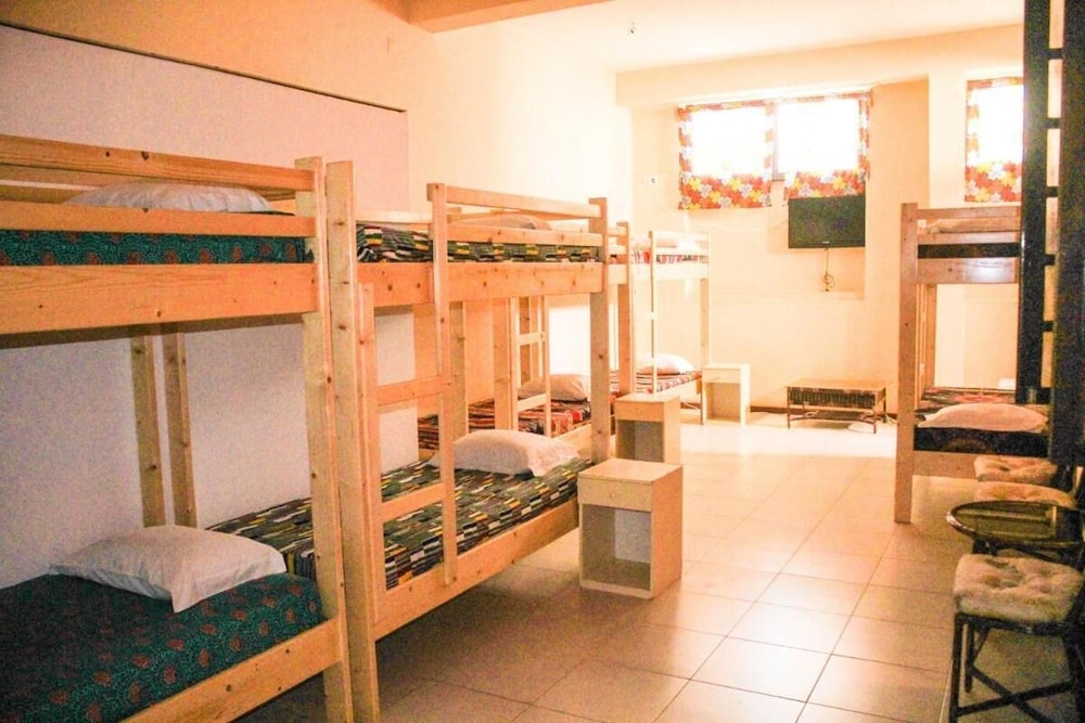 Room in Guest Room - Bed in Mixed Dormitory Room in Vila do Maio
