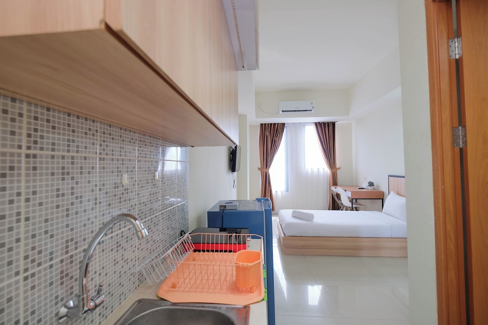 Warm And Cozy Studio At Evenciio Margonda Apartment