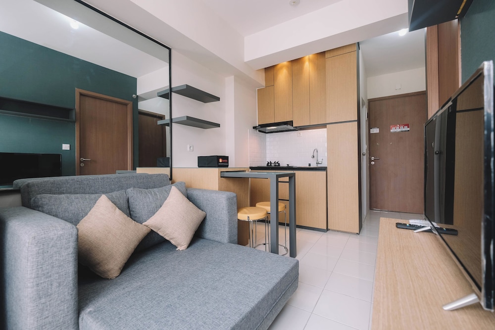 Simple and Cozy Living 2BR at Podomoro Golf View Apartment