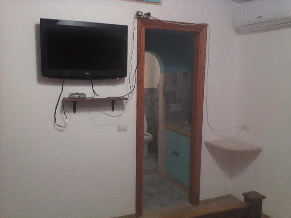Daillu en Olbia — hotel room