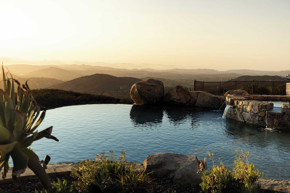 Infinity Pool, Theater, Pickleball + 360 Views Near Lake Poway Sunset Point Estate by Avantstay