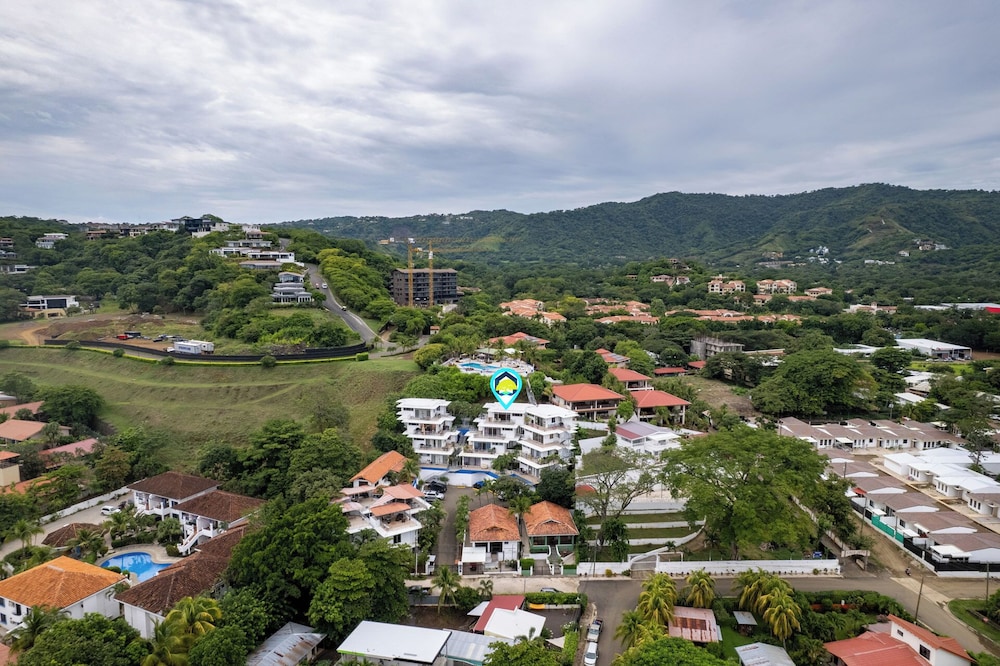 Modern Top-Floor Condo with Panoramic Views and Community Pool