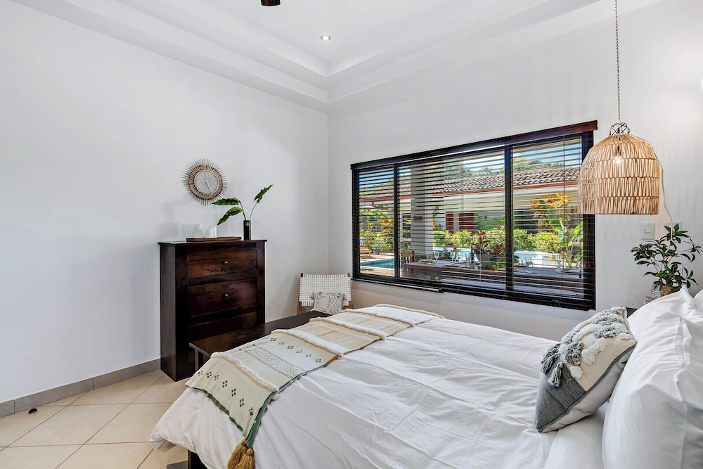 Stylish Home with Chic Decor, Luxury Amenities & Tropical Outdoor Oasis with Sparkling Private Pool