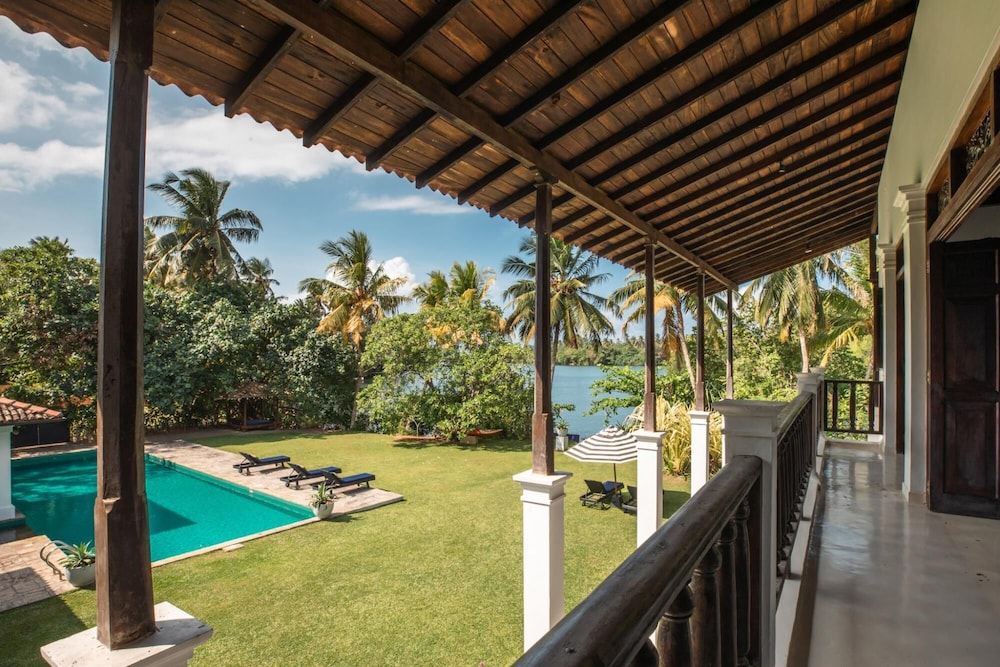 Lovely Lakeside Villa With Large Pool Poolside Dining view 3