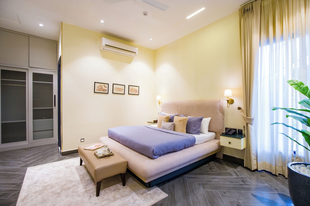 ELIVAAS Ibiza Luxe 4-BHK Farmhouse