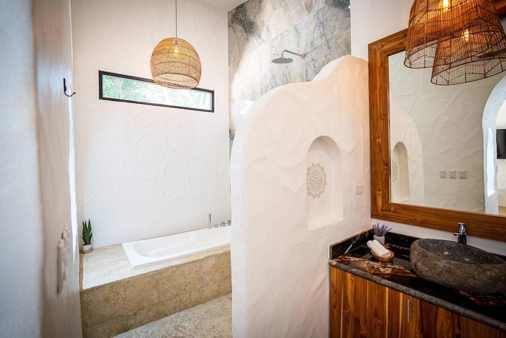 Bohemian Tropical Villa with a Tiki-Style Swimming Pool & Swim-Up Bar with an Attached Studio Apartment