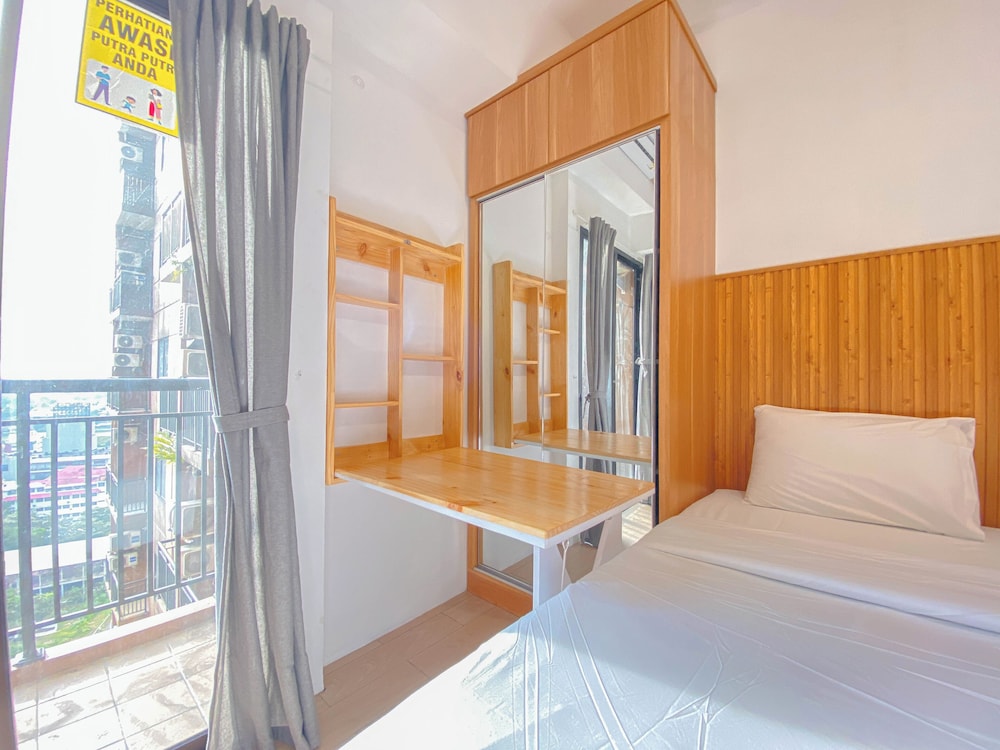 Homey & Restful Studio At Tamansari Panoramic Apartment