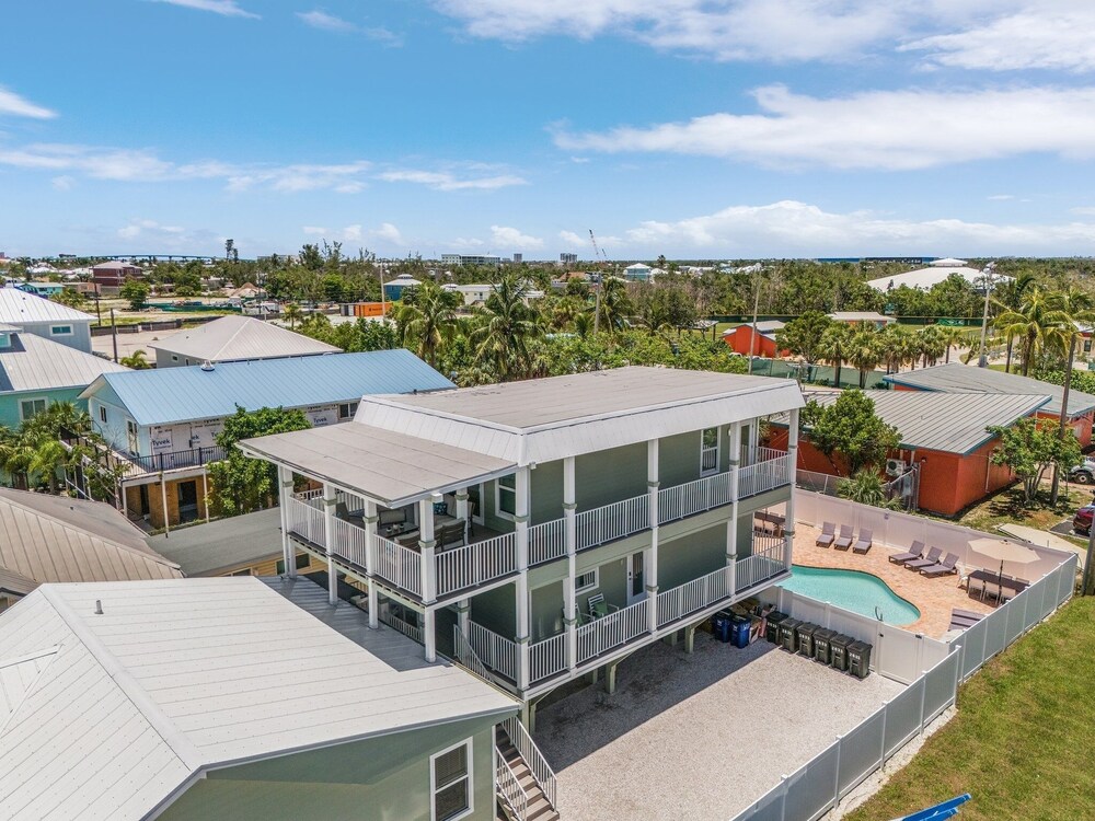 Coconut Sunsets A & B on Estero Blvd, 7 Bedroom Hom by RedAwning