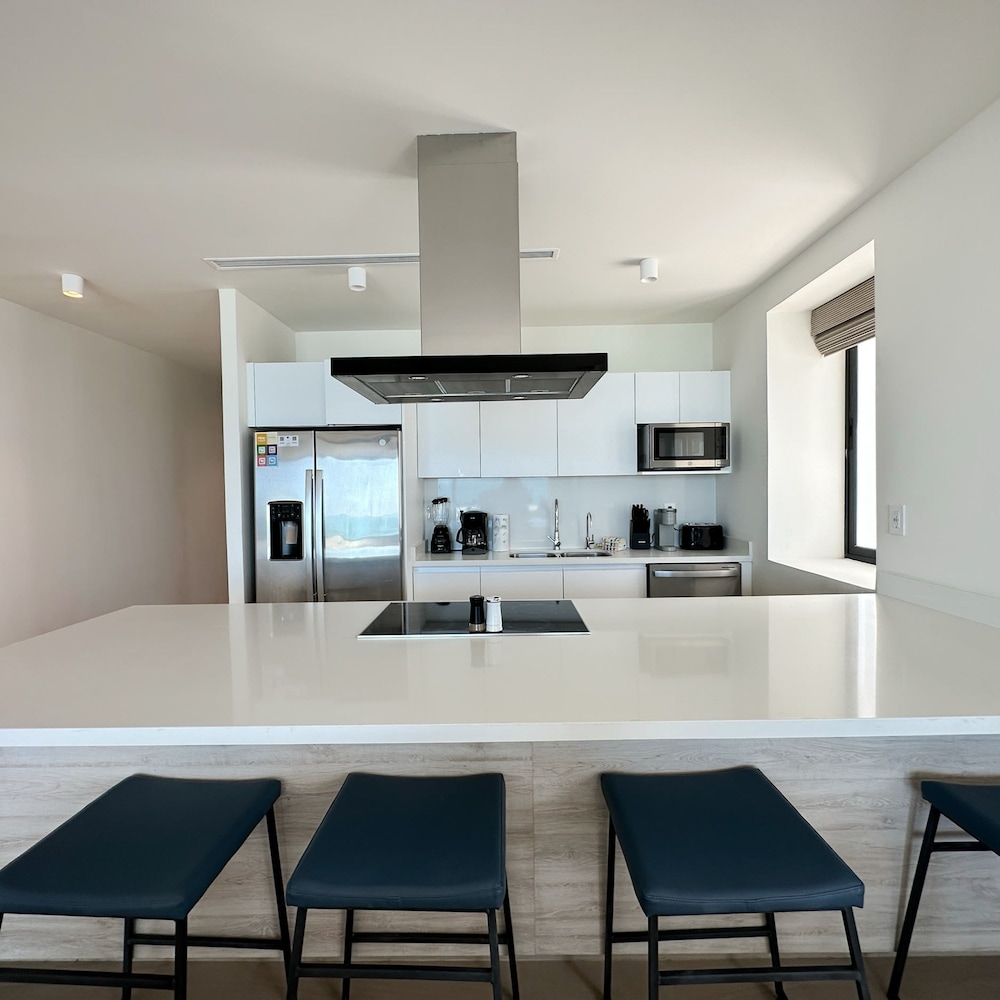 Brand-new Modern 2BR Gem on Iconic Sandy Beach