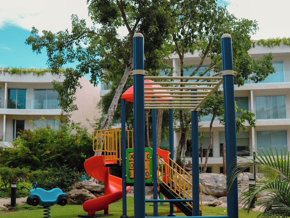 Stylish Playacar Condos w Balcony & Pool