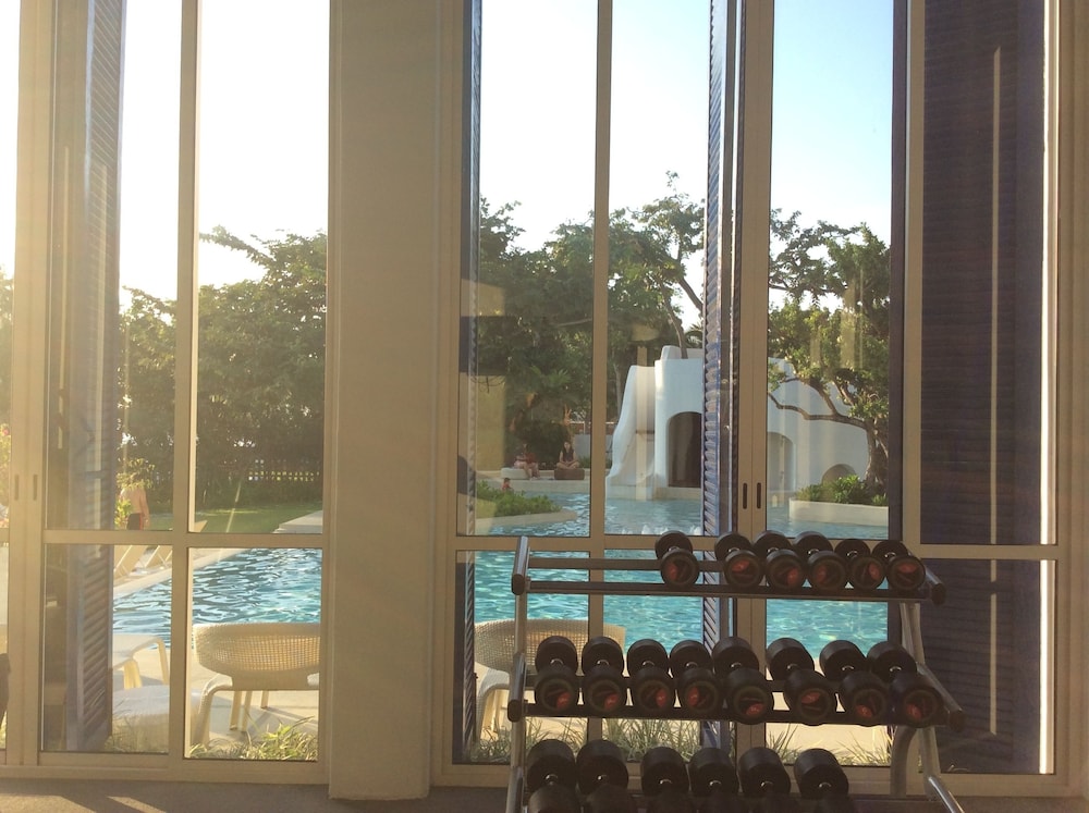 The Che Pool Access Beachfront Condo by Away