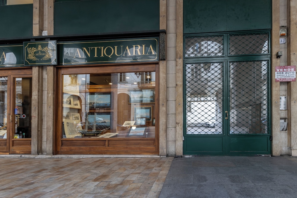Turin Bed & Books by Wonderful Italy