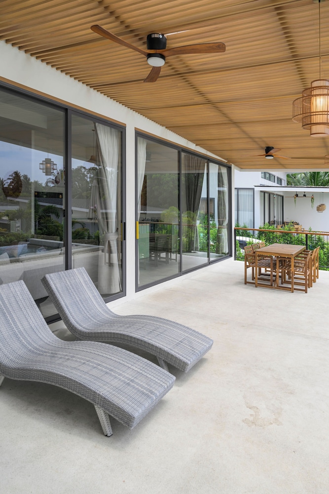 Tropical Poolside Retreat by Sea N' Rent