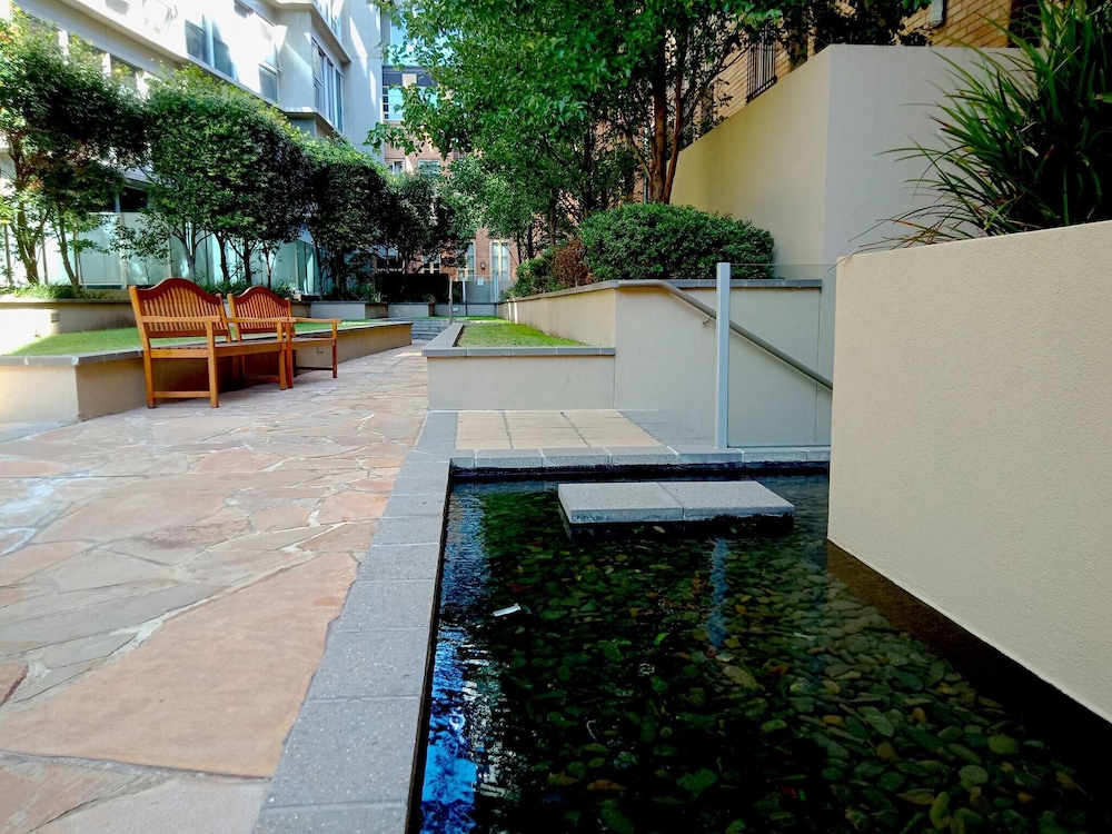 Unwind in Style at Melbourne's Historic Art Deco Apartment With Pool Gym Carpark