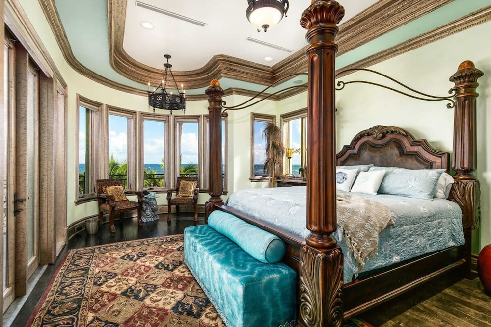Luxurious 3-story Estate With Gym Pool Slide Private Beach and Lighthouse Views