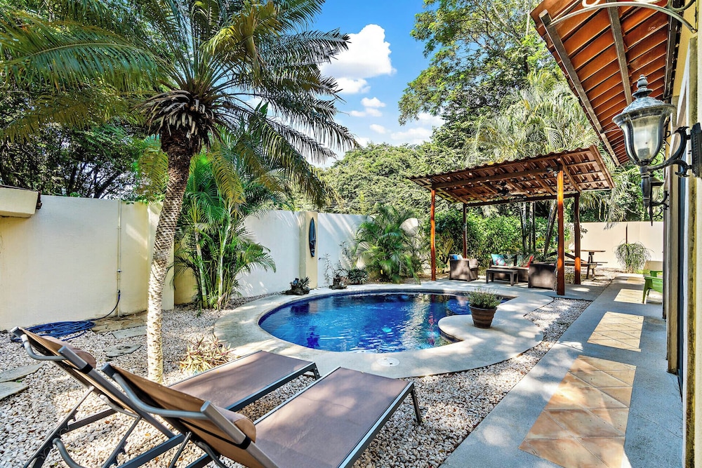 Inviting Home with Colorful Decor and Private Backyard Oasis with a Swimming Pool & Shaded Terrace