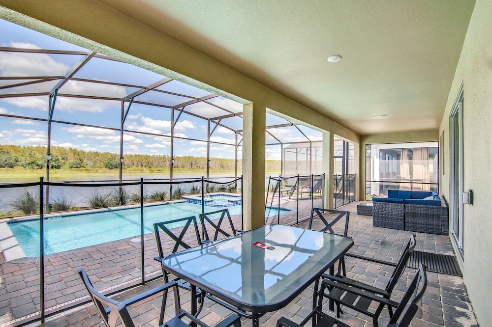 Serenity Lakeview Retreat Stunning Water Views, No Rear Neighbors, Private Pool, Game Room & Star Wars Cinema
