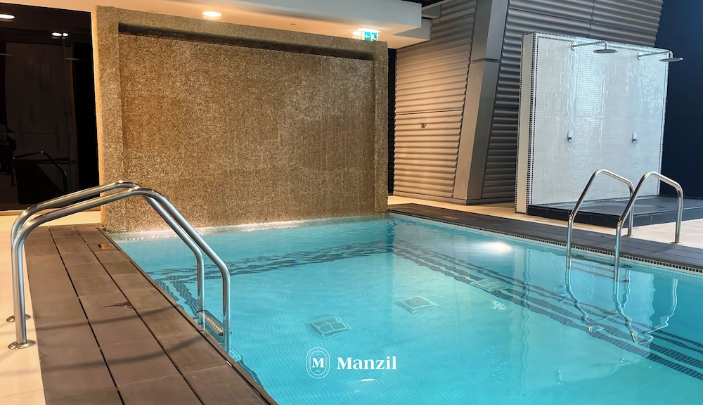 Manzil-1BR Apartment with Skyline Views