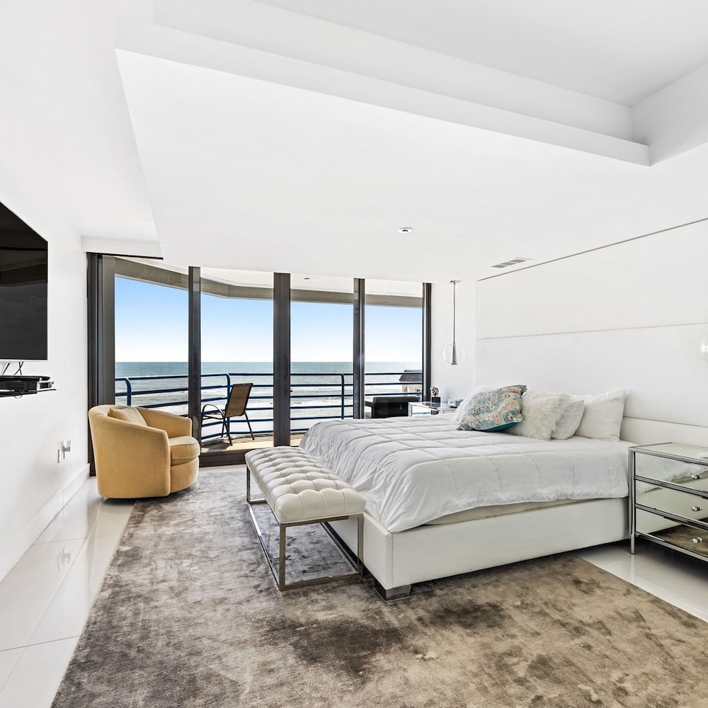 Luxurious Contemporary Corner Condo Overlooking Pool Beach Wrap Around Balcony Ebb Tide 401 view 5