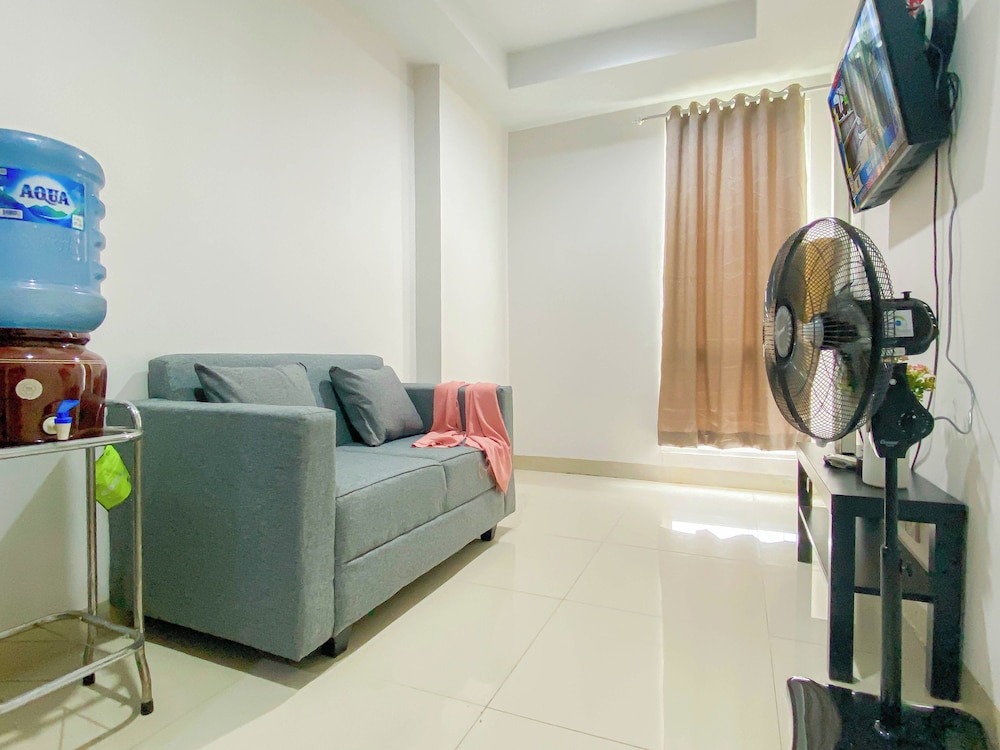 Simple 2Br At Azalea Suites Apartment