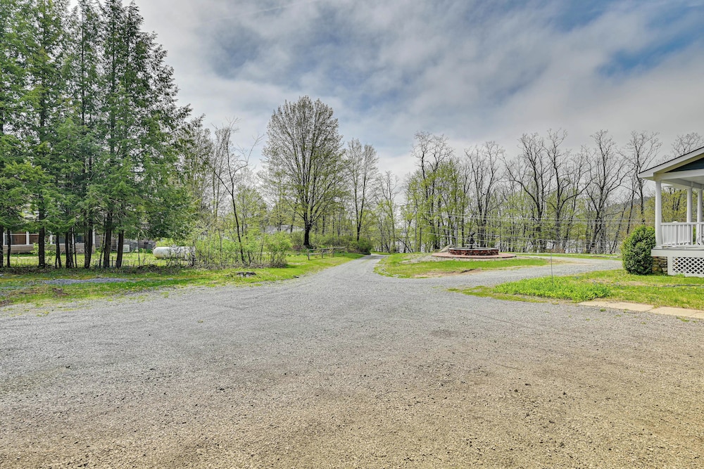 Fire Pit + Beach Access: Quiet Northville Retreat
