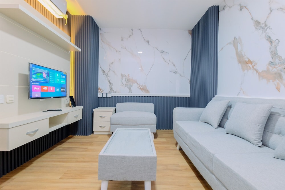 Restful and Modern 2BR at Sentul Tower Apartment