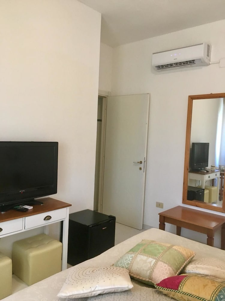 Charlotte Maison en Cagliari — hotel room