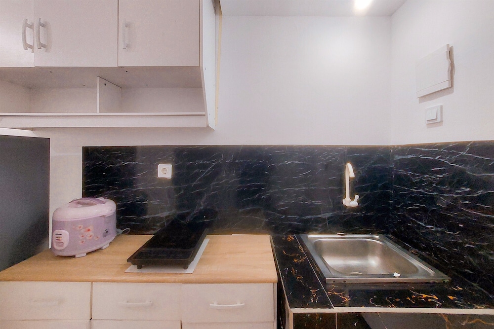 Homey and Restful Studio Urbantown Serpong Apartment