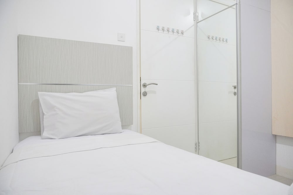Homey And Strategic 2Br At Bassura City Apartment