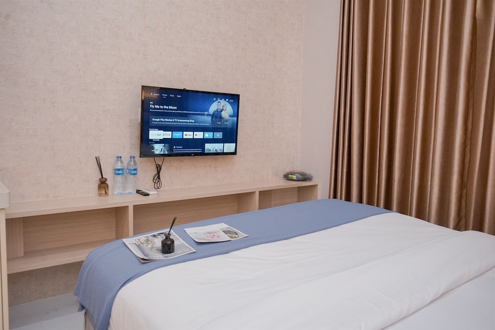 Simply And Cozy Studio Room At Sky House Bsd Apartment