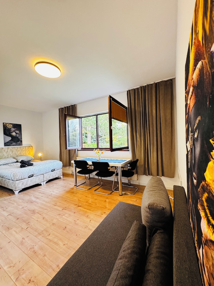 Central 8BR Stay with Garden and Terrace