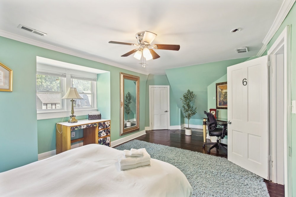 Charming Victorian Home With Porch & Large Yard 7 Bedroom Home