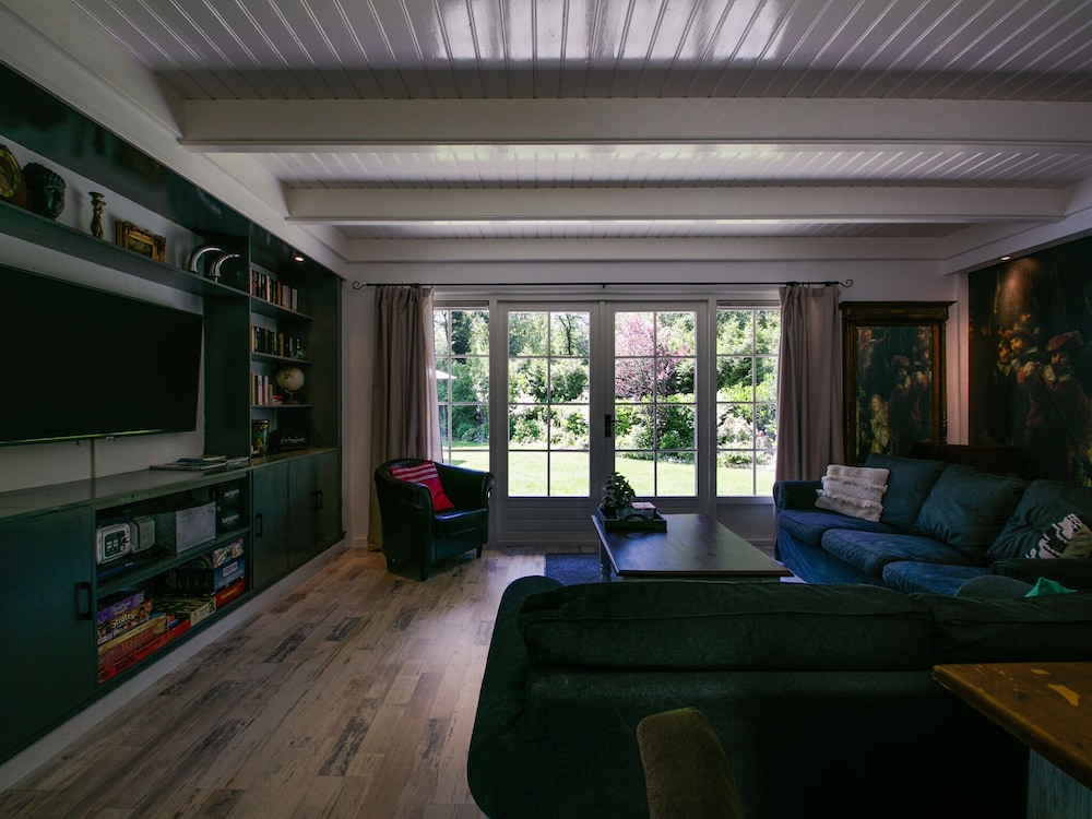 A Detached Bungalow With Outdoor Fireplace, Covered Terrace and Pond in a Forest Plot view 5