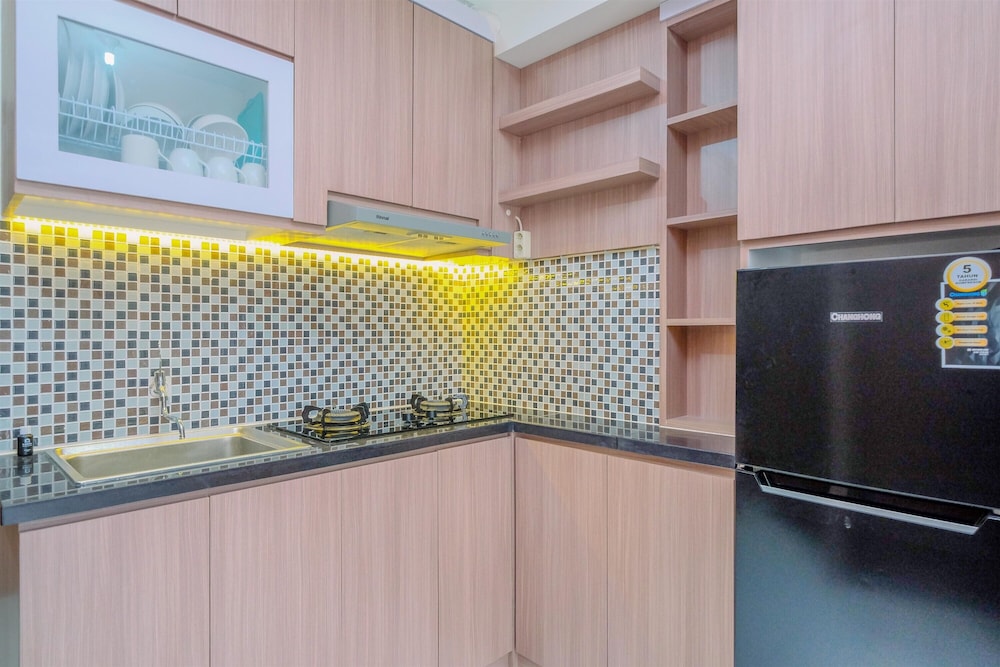 Modern Look and Restful 2BR Podomoro Golf View Apartment