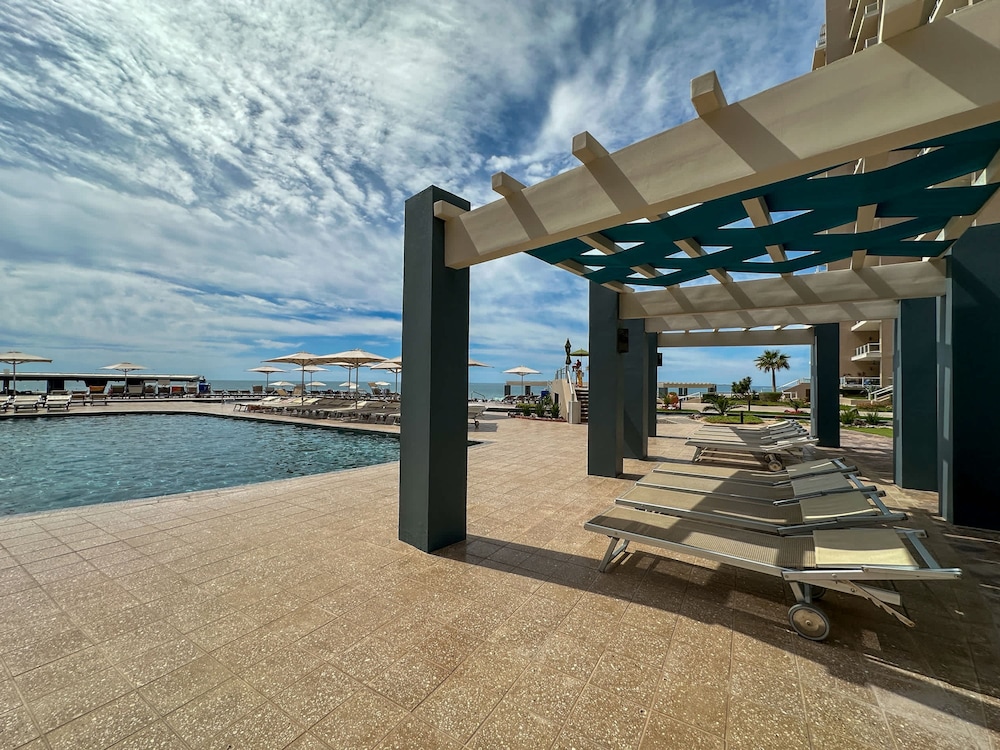 Brand-new Modern 2BR Gem on Iconic Sandy Beach