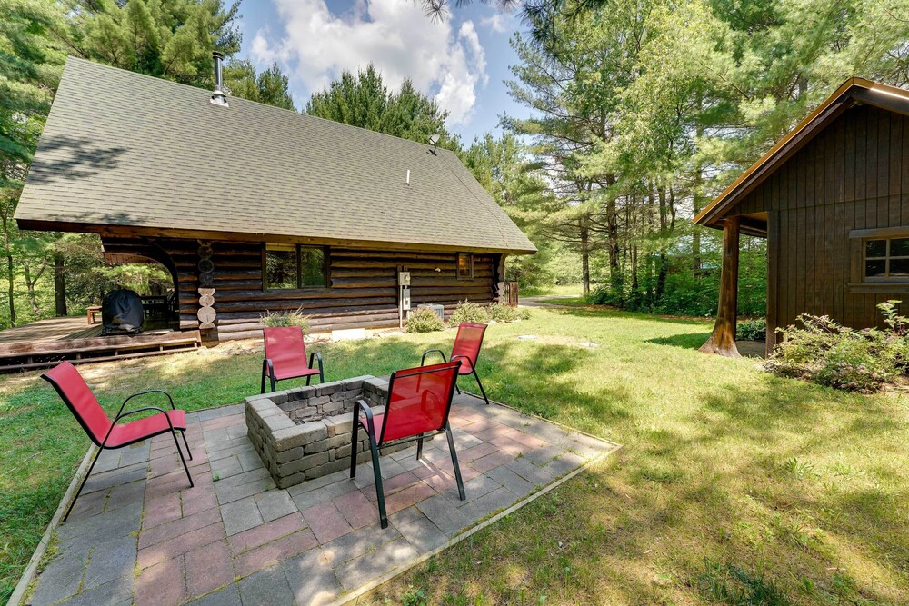 Secluded Log Cabin in NW Michigan: Hot Tub Deck - Property Image 10