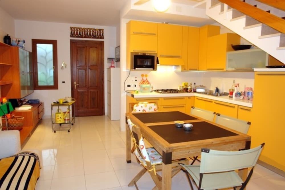 Excellently Equipped row House With Fenced Garden for 8 in Lignano Pineta