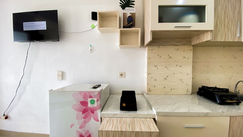 Homey And Cozy Living Studio At Poris 88 Apartment