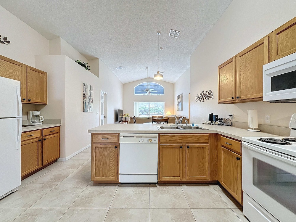 South Facing Pool Home With Golf Course Views