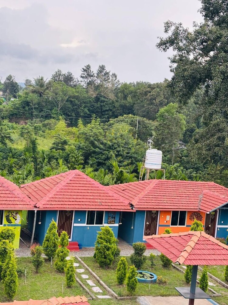 COORG SUNRISE COTTAGES