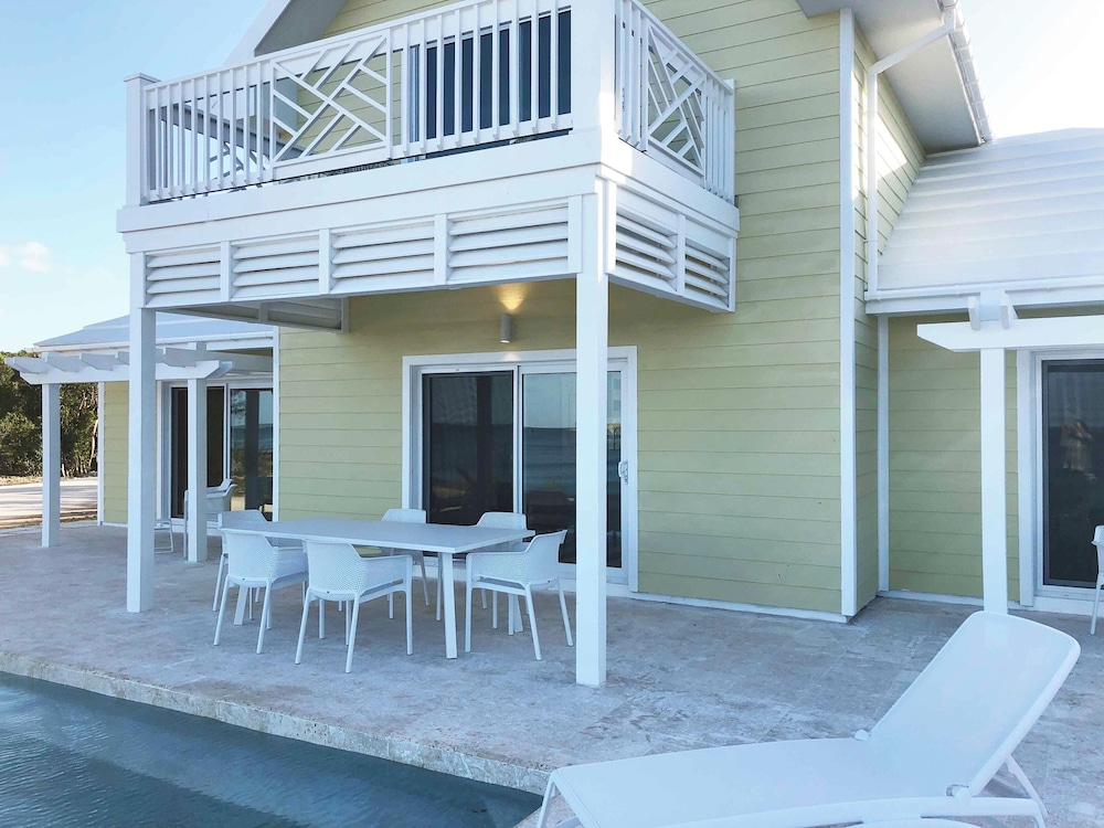 Oceanfront Haven: Elegant Estate With Private Deck