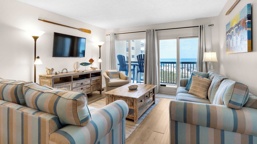 Beachfront Charm Meets Lake Life + Free Tickets: Dolphin Cruise & More!