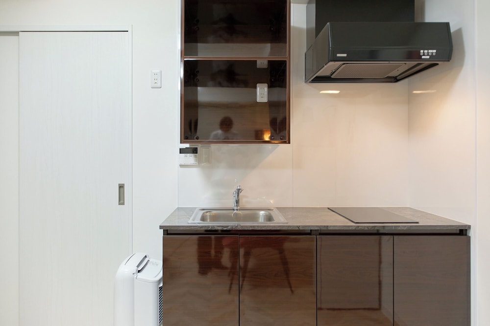 The under suite residence Ikebukuro by Tranova