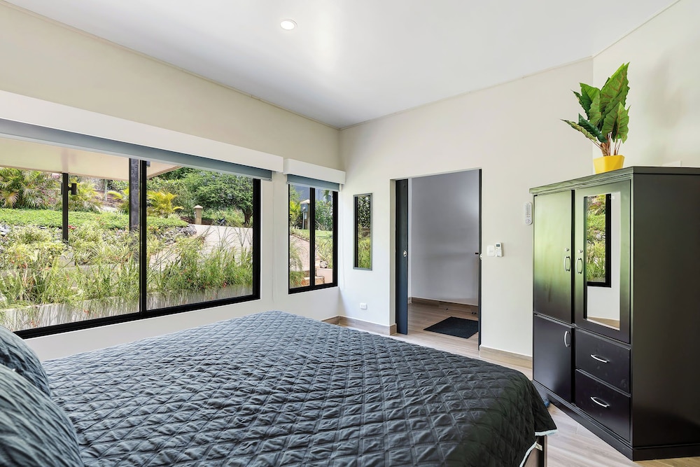 Villa with Minimalist Design & Scenic Deck with Private Infinity Pool and Jungle Views